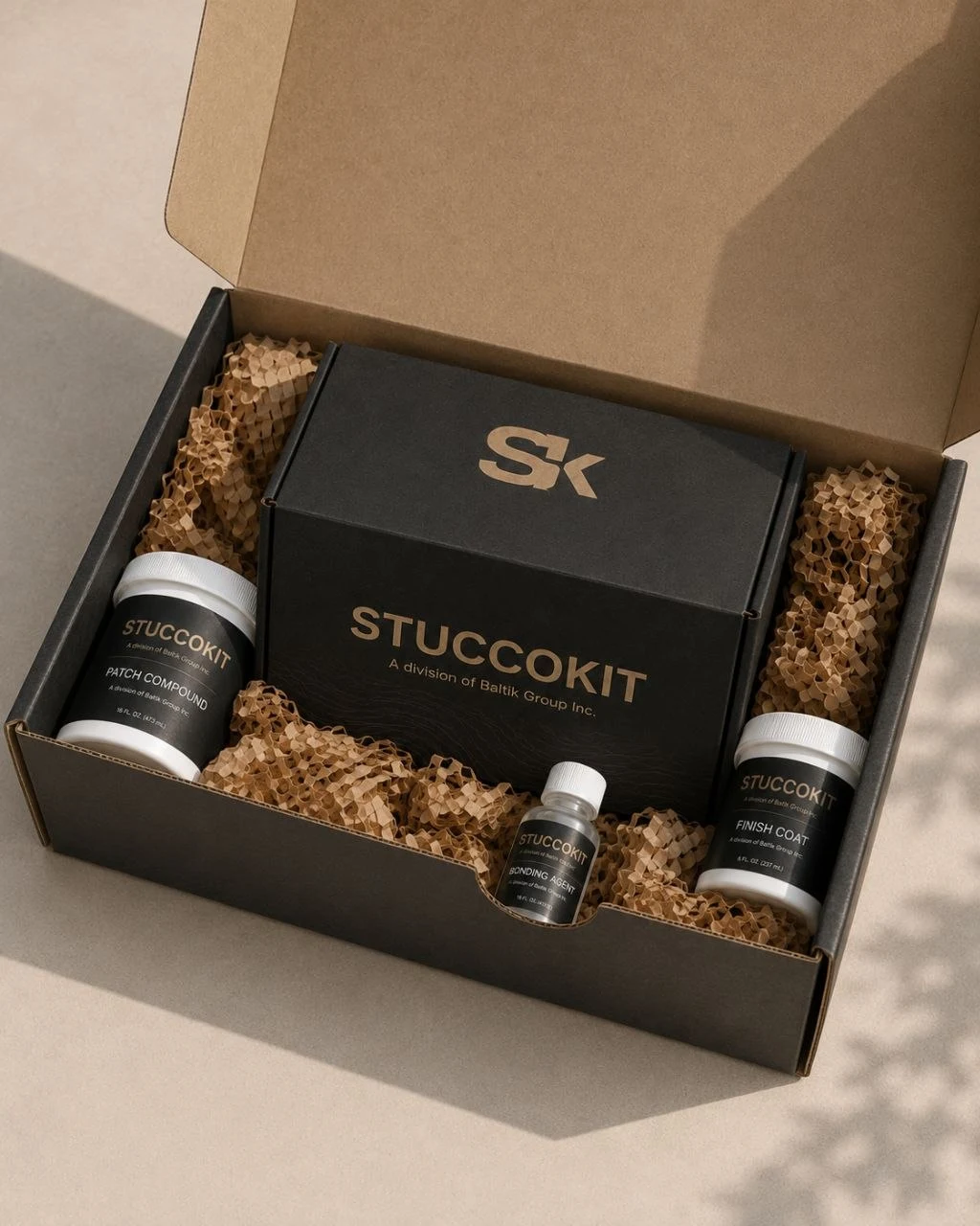 StuccoKit branded shipping box